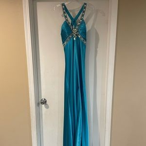 Women’s blue size 10 prom dress. Worn once.
